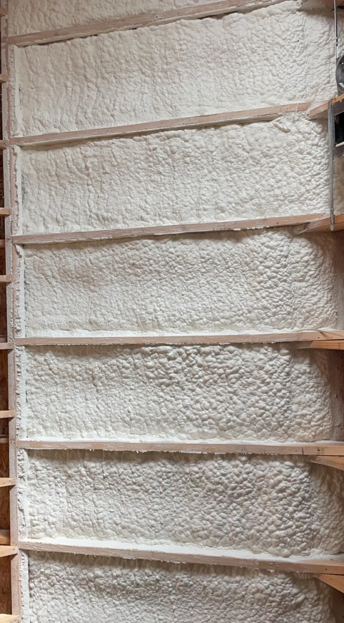 Insulation installed near attic framing